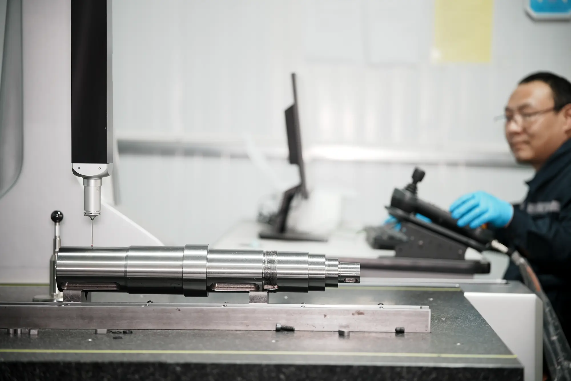Precision shaft under dimensional inspection
